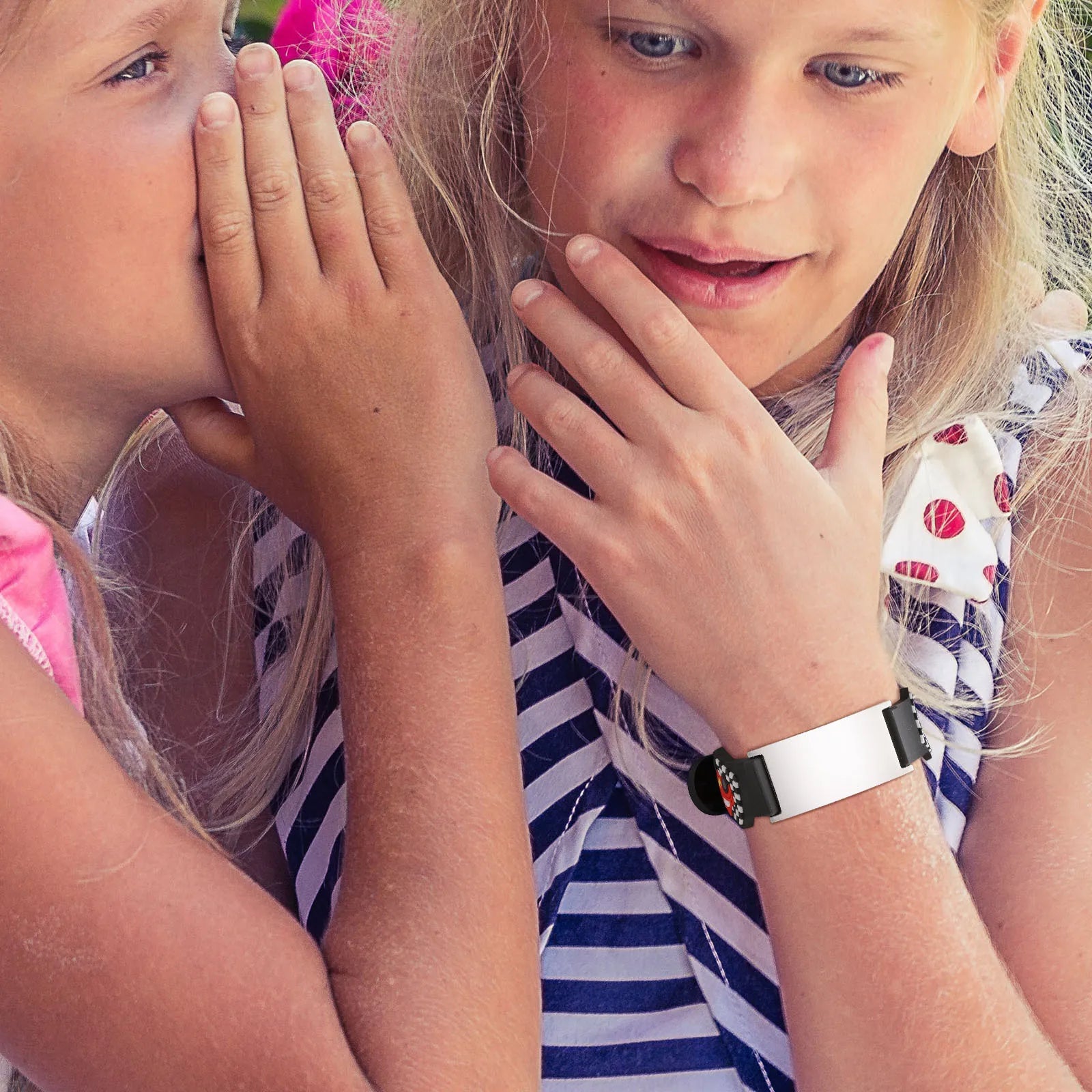 Girl wearing a personalized kids Medical ID bracelet for everyday safety